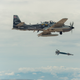 Embrauer Super Tucano aircraft dropping a laser-guided bomb as part of the light attack aircraft competition, 2017.